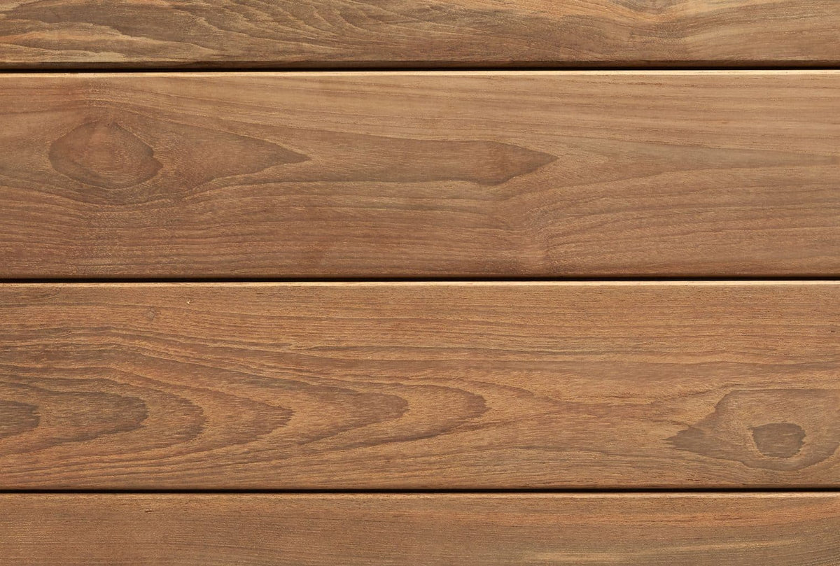Close view of brown teak deck boards with narrow gaps