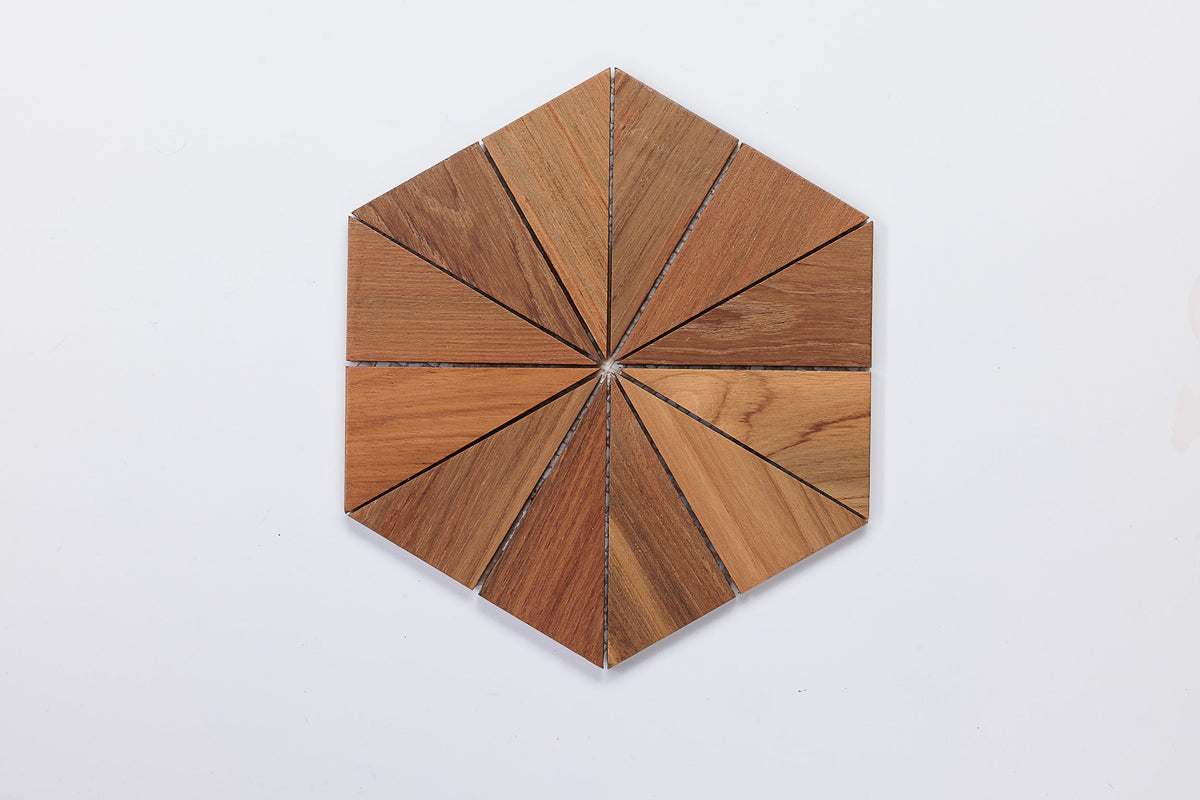 Triangular teak mosaic pieces arranged as a hexagonal fan-pattern sample on a white background